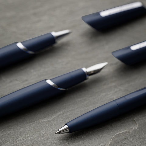 Pininfarina Segno "PF TWO Oracle Red Bull Racing" in its three pen versions: Fountain Pen, Rollerball and Ballpoint uncapped, in the color dark blue.