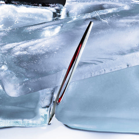 Pininfarina Segno "Aero" inkless pen with ethergraf tip with aluminum silver and red body with ice background.