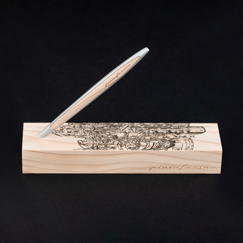 Pininfarina Segno "Cambiano Engine Maserati Special Edition" luxury ethergraf inkless pen with aluminum body and cedar wood inserts standing in its cedar wood base with a drawing of an engine in a black background.