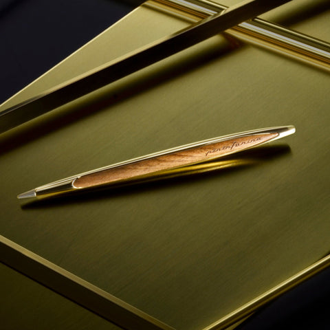 Pininfarina Segno "Cambiano Luxury" Ethergraf Inkless pen with gold plated stem and walnut wood inserts.