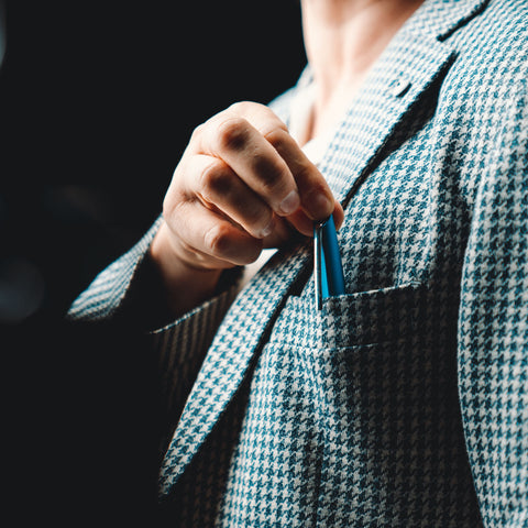 Man with the Pininfarina Segno "PF TWO" in its blue rollerball pen version in the front pocket of his jacket.