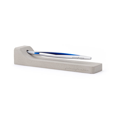 Elegant man holds Pininfarina Segno "Aero" inkless pen with ethergraf tip with aluminum silver and blue body.