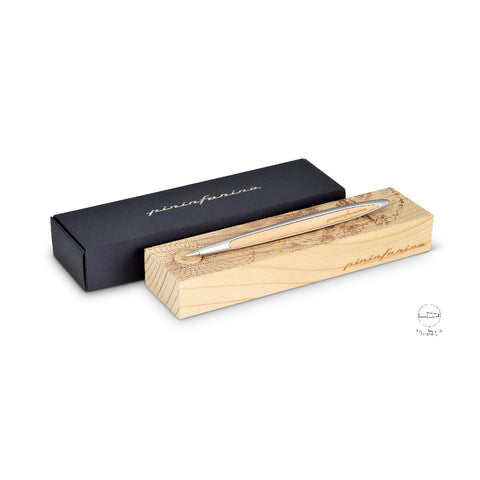 Pininfarina Segno "Cambiano Leonardo Drawing" special Leonardo Da Vinci edition. Ethergraf Inkless pen with aluminum body and walnut wood inserts, lying in its base, that has engraved a portrait of Da Vinci in pointillism, next to its packaging box.