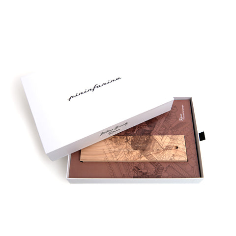 Packaging and base of the Pininfarina Segno "Cambiano Italian Beauty" Ethergraf Inkless or ballpoint pen with plans the city of Italy Rome in a white background.
