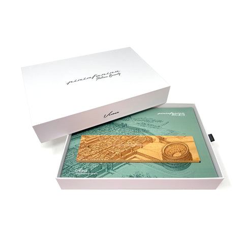 Packaging and base of the Pininfarina Segno "Cambiano Italian Beauty" Ethergraf Inkless or ballpoint pen with plans the city of Italy Verona in a white background.