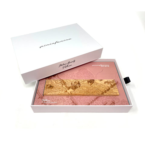 Packaging and base of the Pininfarina Segno "Cambiano Italian Beauty" Ethergraf Inkless or ballpoint pen with plans the city of Italy Palermo in a white background.