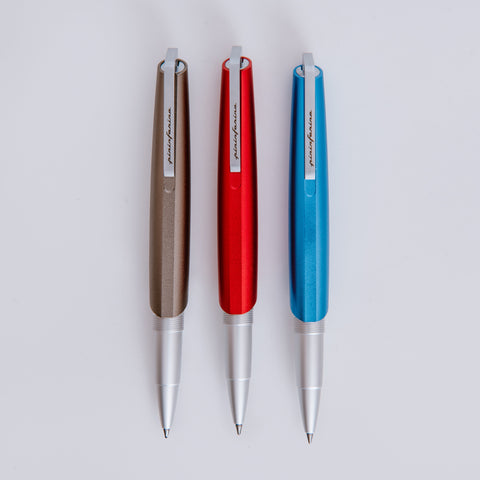 Pininfarina Segno "PF GO Rollerball" pen in its three versions: blue, titanium and red.
