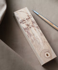 Pininfarina Segno "Cambiano Leonardo Drawing" special Leonardo Da Vinci edition in Ethergraf Inkless pen with aluminum body and walnut wood inserts next to its base that has engraved a portrait of Da Vinci in pointillism.