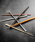 FO - Forever Made In Italy "Prima" Ethergraf inkless pen with anodized aluminum long body in several variants of color in a glittery black background.