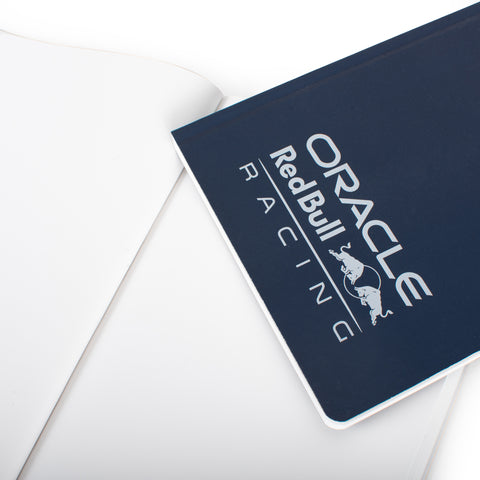 Close up of the Pininfarina Segno "Stone Paper Notebook Oracle Red Bull Racing Edition" in its plain version and white logo version.