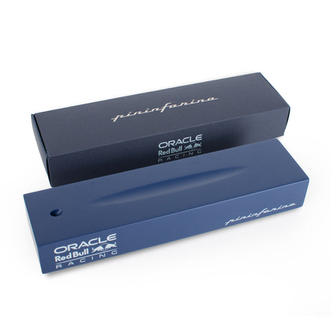 Packaging and blue painted wood base of the Pininfarina Segno "Cambiano Oracle Red Bull Racing" special edition pen.
