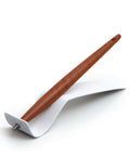 FO - Forever Made In Italy "Piuma Italian Beauty" Pen in the Ethergraf inkless version with pear wood steam, standing in its stainless steel ondulated base.