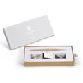 Packaging box of the FO - Forever Made In Italy "Piuma Leonardo Special Edition" ethergraf inkless or ballpoint pen in its pear wood steam version, next to its stainless steel ondulated base. 