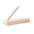 Pininfarina Segno "Cambiano Classic" Ethergraf Inkless pen with silver aluminum body and cedar wood inserts standing in its base in a white background.