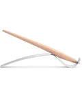 FO - Forever Made In Italy "Piuma Leonardo Special Edition" in the version Acero ethergraf inkless with pear wood steam version, standing in its stainless steel ondulated base. 