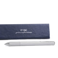 Pininfarina Segno "PF ONE Ballpoint" in its silver version next to its packaging box.