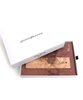 Packaging and base of the Pininfarina Segno "Cambiano Italian Beauty" Ethergraf Inkless or ballpoint pen with plans the city of Italy Rome in a white background.
