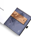 Packaging and base of the Pininfarina Segno "Cambiano Italian Beauty" Ethergraf Inkless or ballpoint pen with plans the city of Italy Milan in a white background.