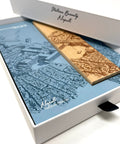 Packaging and base of the Pininfarina Segno "Cambiano Italian Beauty" Ethergraf Inkless or ballpoint pen with plans the city of Italy Naples in a white background.