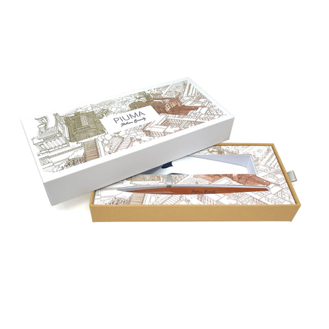 Packaging box of the FO - Forever Made In Italy "Piuma Italian Beauty" Pen with pear wood steam in the version "Roma", along its stainless steel ondulated base. The box contains plans drawings of the city of Rome.